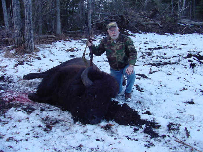 Bill Warther from South Carolina with trophy bison at Echo Lake Hunts in Saskatchewan
