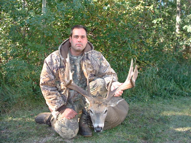 Randy Slaton from Texas with trophy whitetail at Echo Lake Hunts in Saskatchewan