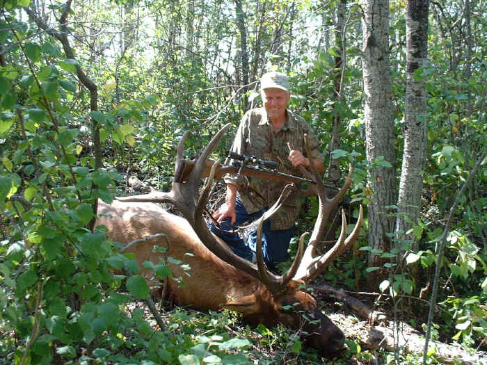 Russell Ericksen from Oregon with trophy elk at Echo Lake Hunts in Saskatchewan