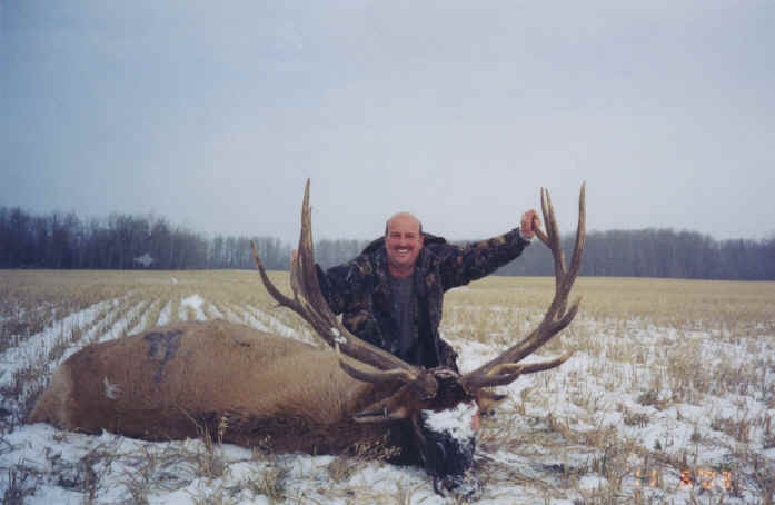 George Tunal with trophy elk at Echo Lake Hunts in Saskatchewan