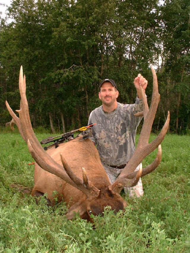 Brett Koenig from Texas with trophy bull elk at Echo Lake Hunts in Saskatchewan