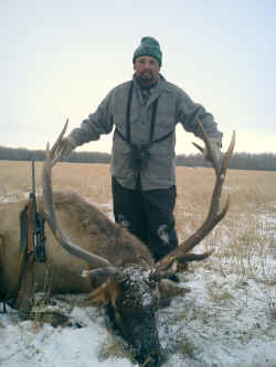 David Serna from California with trophy elk at Echo Lake Hunts in Saskatchewan