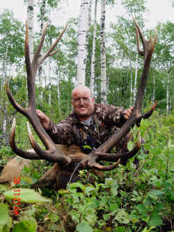 George Tunal from Texas with trophy elk at Echo Lake Hunts in Saskatchewan