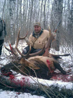 Jerry Ross from California with trophy elk at Echo Lake Hunts in Saskatchewan