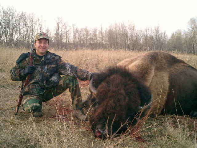 Lorenzo Perea from Texas with trophy bison at Echo Lake Hunts in Saskatchewan