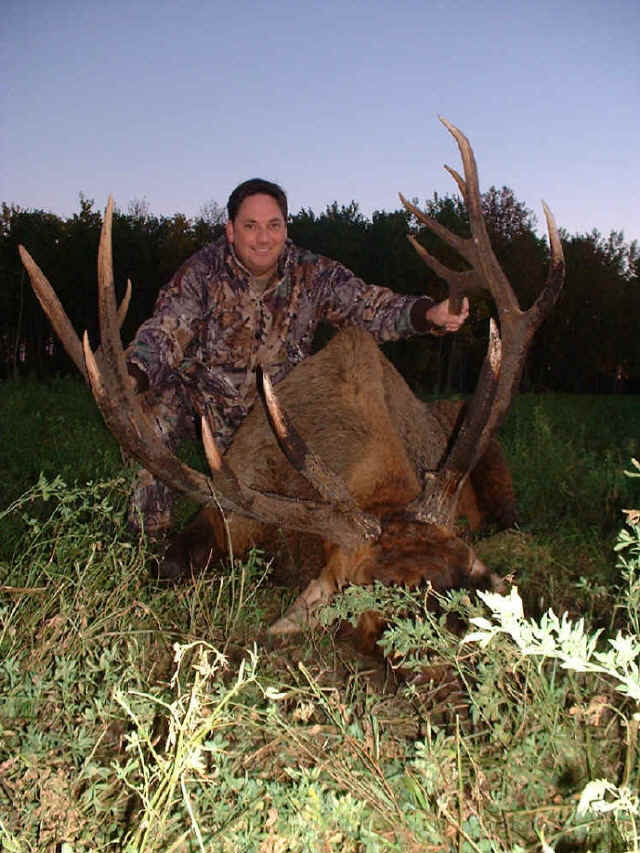 Wendell Hutchins from Texas with trophy elk at Echo Lake Hunts in Saskatchewan