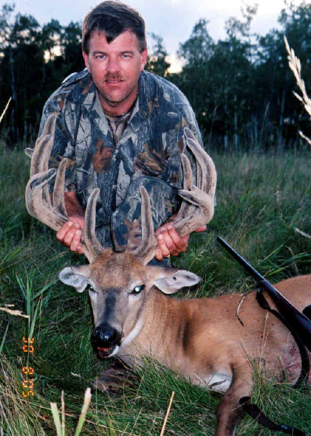 Eddie Whitworth from Texas with trophy whitetail at Echo Lake Hunts in Saskatchewan