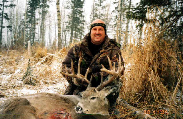 George Tunal from Texas with trophy whitetail at Echo Lake Hunts in Saskatchewan