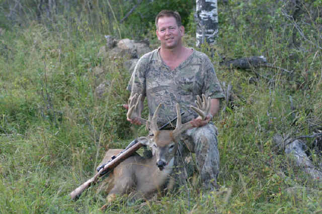 Roger Roulette from Texas with trophy whitetail at Echo Lake Hunts in Saskatchewan
