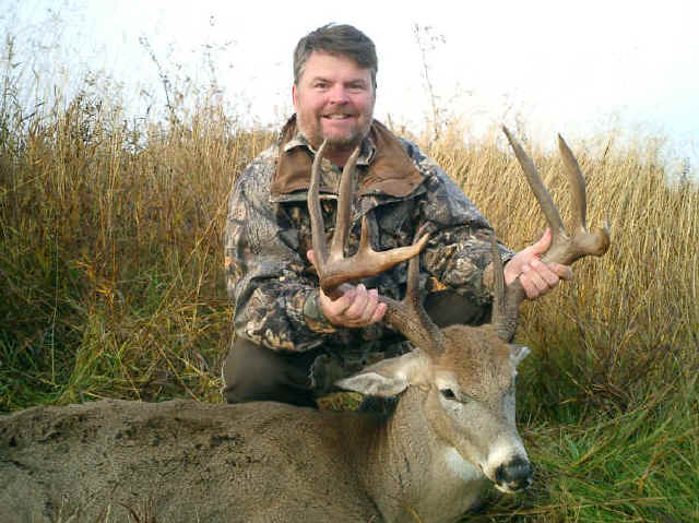 Tony Muscat from Texas with trophy whitetail at Echo Lake Hunts in Saskatchewan