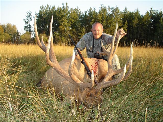 Bri Leavitt from Utah with trophy elk at Echo Lake Hunts in Saskatchewan