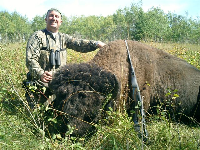 George Tunal from Texas with trophy bison at Echo Lake Hunts in Saskatchewan