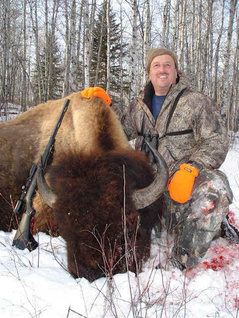 George Tunal from Texas with trophy bison at Echo Lake Hunts in Saskatchewan