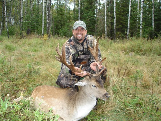 Jeram Dastrup from Utah with trophy whitetail at Echo Lake Hunts in Saskatchewan