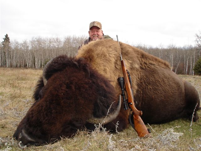Rich Anger from Michigan with trophy bison at Echo Lake Hunts in Saskatchewan