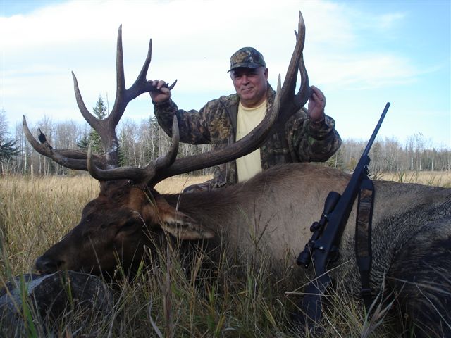Bill Aston from California with trophy bull elk at Echo Lake Hunts in Saskatchewan