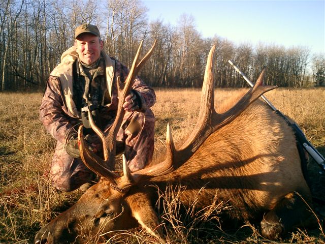 Craig Colelli from Texas with trophy bull elk at Echo Lake Hunts in Saskatchewan
