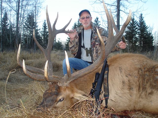 Lester Brenann from New Mexico with trophy bull elk at Echo Lake Hunts in Saskatchewan
