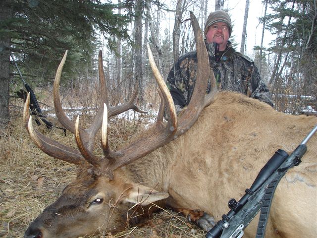Mitchell Brown from Texas with trophy bull elk at Echo Lake Hunts in Saskatchewan
