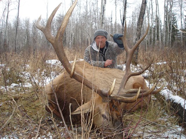 Wade Harlen from Texas with trophy bull elk at Echo Lake Hunts in Saskatchewan