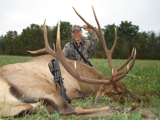 Dennis Kaibara from Hawaii with trophy bull elk at Echo Lake Hunts in Saskatchewan