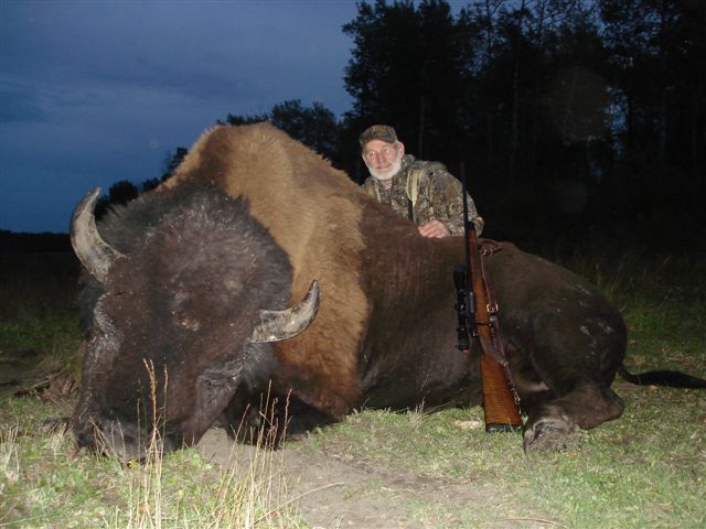Tom Bray from Indiana with trophy bison at Echo Lake Hunts in Saskatchewan