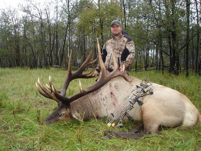 Colin Johnson from Florida with trophy bull elk at Echo Lake Hunts in Saskatchewan