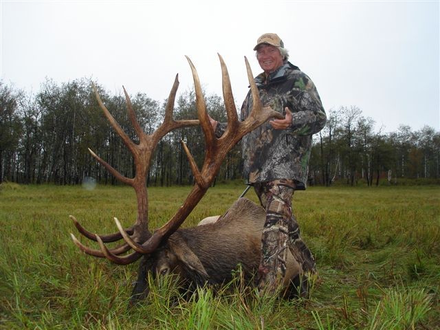 Douglas Johnson Jr from Florida with trophy bull elk at Echo Lake Hunts in Saskatchewan