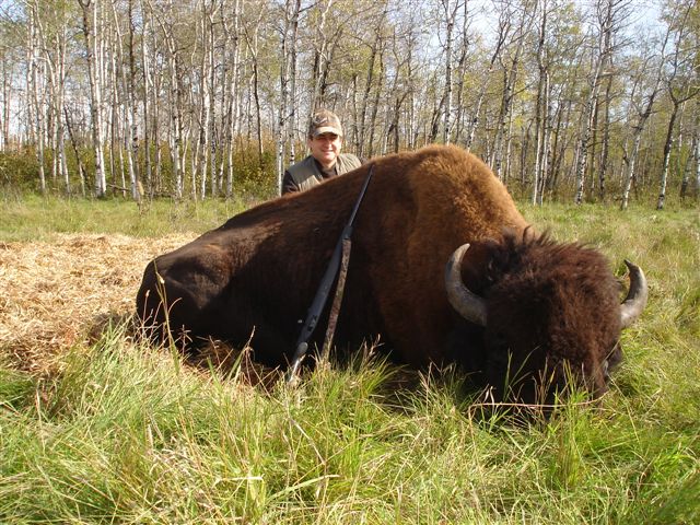 Gabriel Zambrano from Mexico with trophy bison at Echo Lake Hunts in Saskatchewan