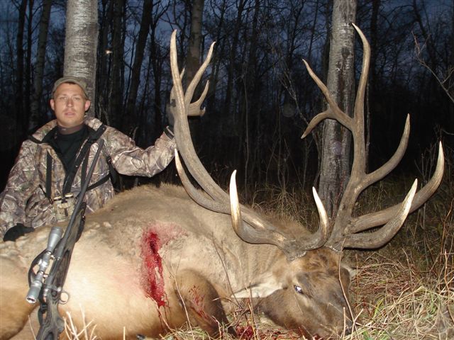 Jordon Brown from Indiana with trophy bull elk at Echo Lake Hunts in Saskatchewan