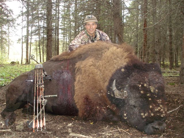Lorenzo Barrera from Mexico with trophy bison at Echo Lake Hunts in Saskatchewan