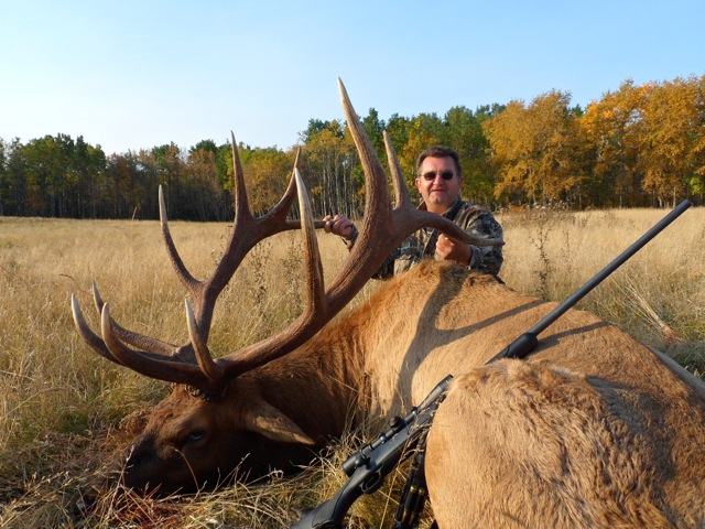 Daniel Goudeau from California with trophy bull elk at Echo Lake Hunts in Saskatchewan