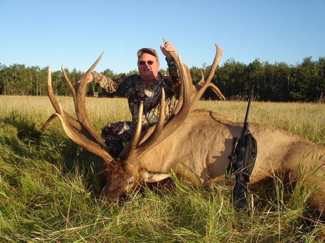 Paul Hinson from Texas with trophy bull elk at Echo Lake Hunts in Saskatchewan