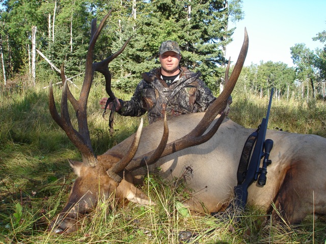 Raymond Boone from Alabama with trophy bull elk at Echo Lake Hunts in Saskatchewan
