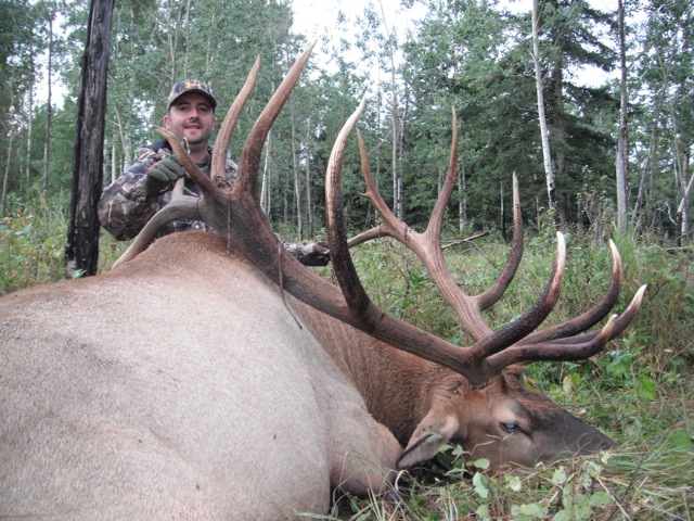Brian Jarvis from Texas with trophy bull elk at Echo Lake Hunts in Saskatchewan