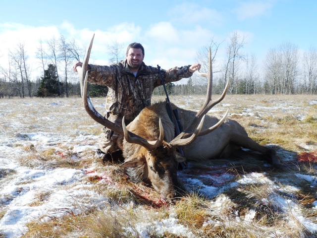 James Wood from West Virginia with trophy bull elk at Echo Lake Hunts in Saskatchewan