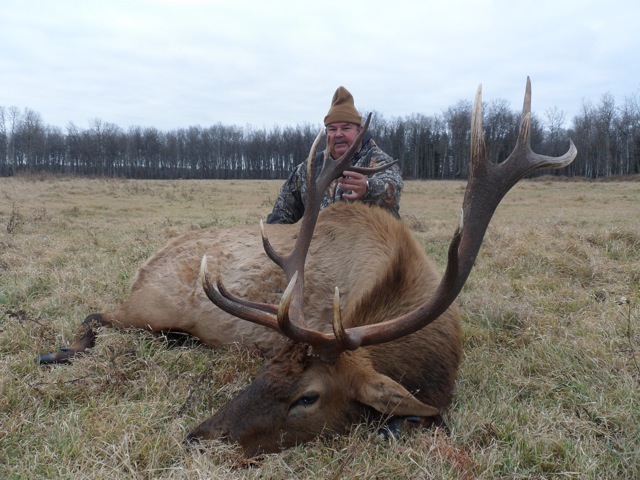 Ricky Ashworth from Texas with trophy bull elk at Echo Lake Hunts in Saskatchewan