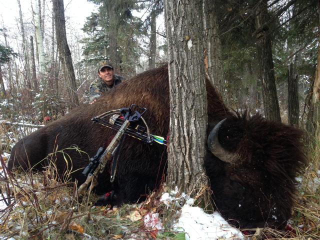 Emilio Brunn from Mexico with trophy bison at Echo Lake Hunts in Saskatchewan