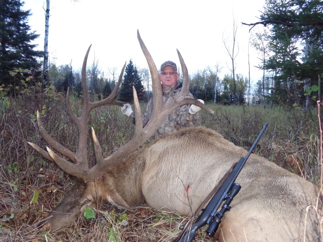 Eddie Davies from Colorado with trophy bull elk at Echo Lake Hunts in Saskatchewan