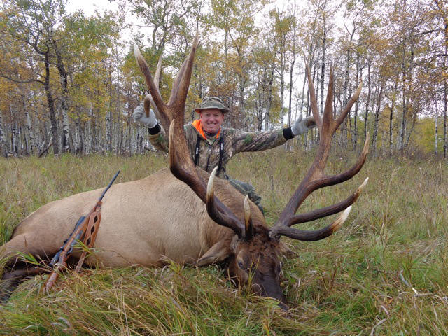 Phil Lawson from Texas with trophy bull elk at Echo Lake Hunts in Saskatchewan