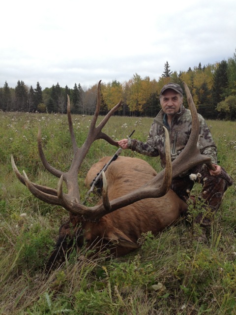 Barry Demchuk from Canada with trophy bull elk at Echo Lake Hunts in Saskatchewan