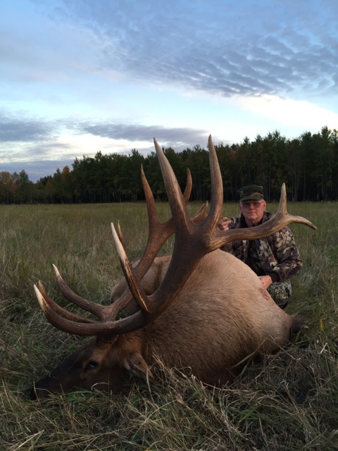 Charles Campbell from Mississippi with trophy bull elk at Echo Lake Hunts in Saskatchewan