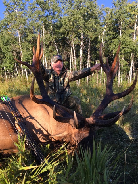 Jerry Rector from New Mexico with trophy bull elk at Echo Lake Hunts in Saskatchewan