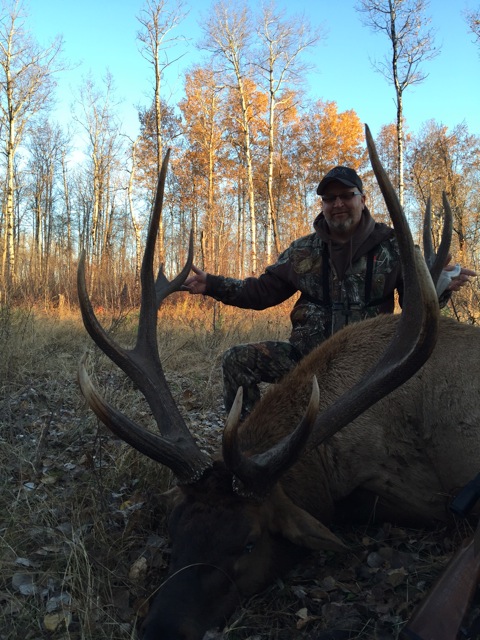 Scott Petterson from South Dakota with trophy bull elk at Echo Lake Hunts in Saskatchewan