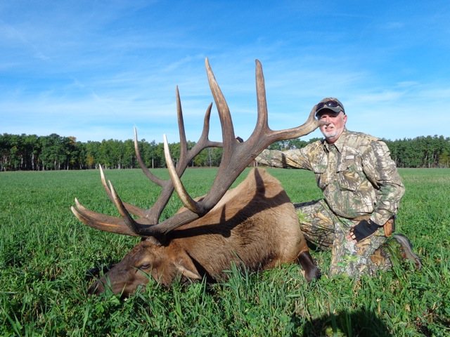 Wes Regan from Texas with trophy bull elk at Echo Lake Hunts in Saskatchewan