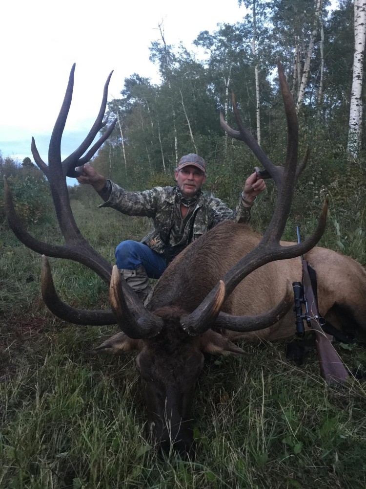 Craig Hystad from North Dakota with trophy bull elk at Echo Lake Hunts in Saskatchewan