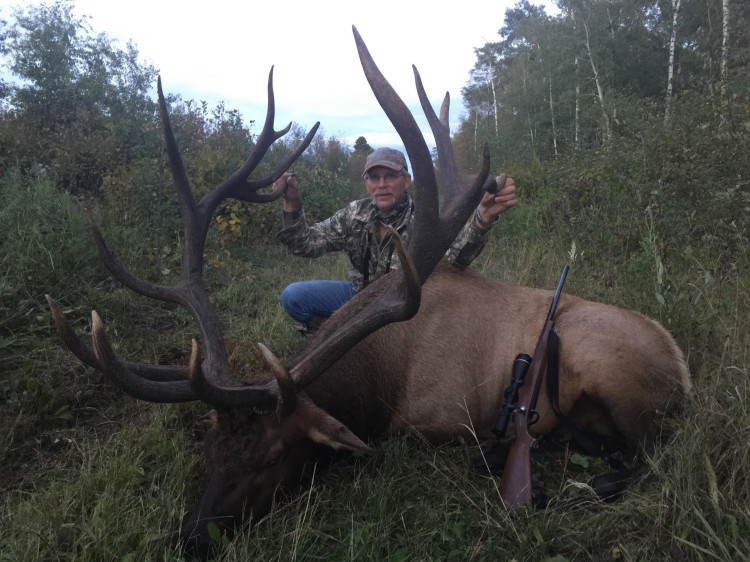 Craig Hystad from North Dakota with trophy bull elk at Echo Lake Hunts in Saskatchewan