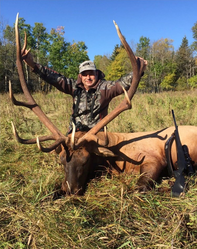 Garry from California with trophy bull elk at Echo Lake Hunts in Saskatchewan