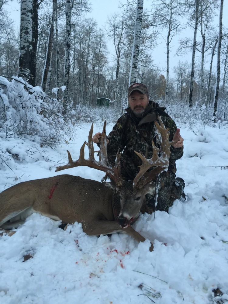 Robert Qualls from Texas with trophy bull elk at Echo Lake Hunts in Saskatchewan