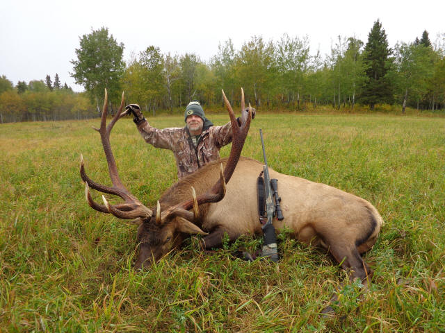 Bob Cotter from Nevada with trophy bull elk at Echo Lake Hunts in Saskatchewan